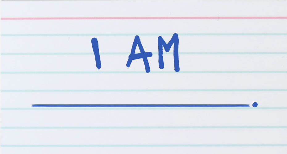 Index card with the words "I Am" written on it, followed by a blank to be filled in.