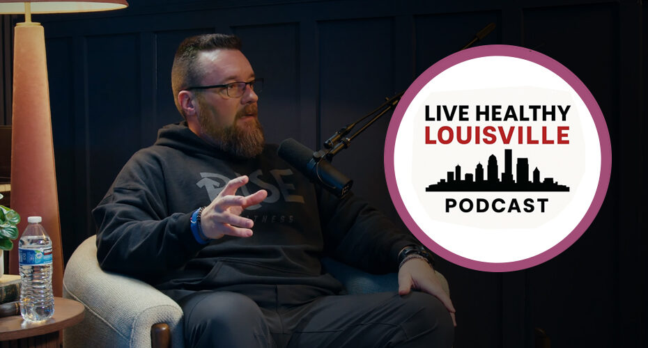 Jason Morrison, a coach at RISE Fitness, is seated in a podcast studio speaking into a mic.